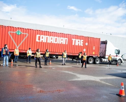 Group of volunteers standing beside a big truck in Greater Vancouver, BC